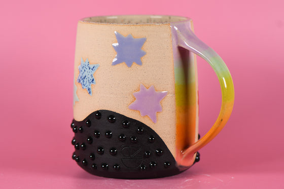 18oz Rainbow Starburst mug 1