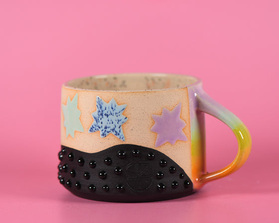 10oz Rainbow Starburst mug 1